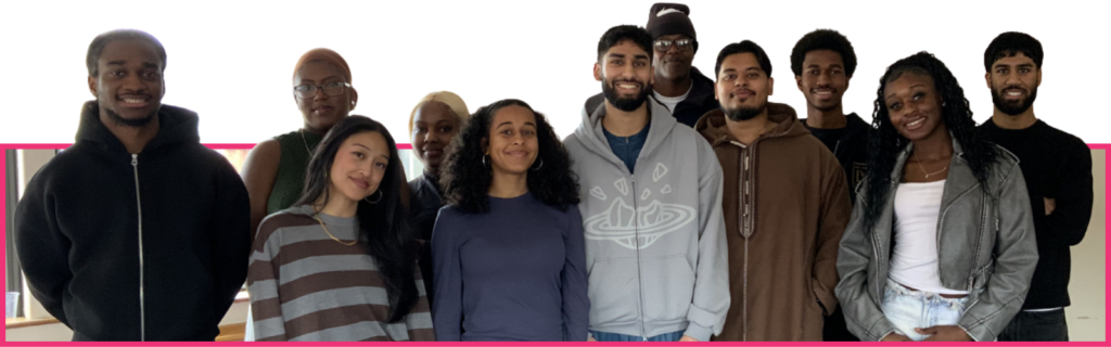 A diverse group of young people pose smiling as the new cohort of Young Facilitators